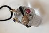 Carved Rock Quartz Skull set with a Star Ruby eye and Diamond Patch in 18ct Gold