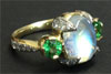 Moonstone and diamond ring with Tsavorties in 18ct gold